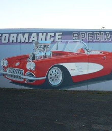 Nice wall painting on wall of Smith Automotive painted by J. S. Logie 1999.