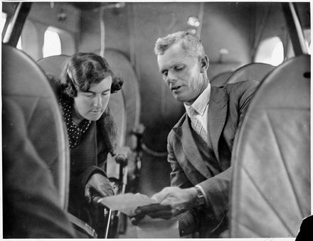 Laura Stannard and Ernest V. "Pop" West inside a Union Airways DH86