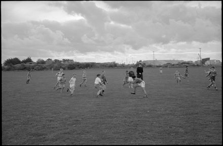 Children playing games of Rugby or Rugby League