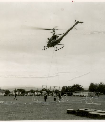 Helicopter Delivering Framing for Standard Brewery Sign