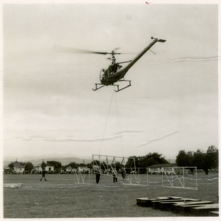 Helicopter Delivering Framing for Standard Brewery Sign