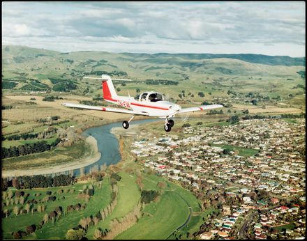 ZK-EVA Piper Tomahawk PA38 ZK-EVA  flying over Fitzroy Bend