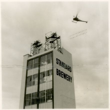 2021P_LionBreweries2-6-1_036068_006 - Helicopter Delivering Framing for Standard Brewery Sign