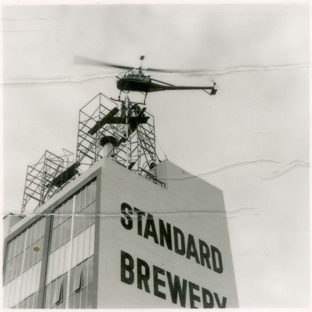 2021P_LionBreweries2-6-1_036068_007 - Helicopter Delivering Framing for Standard Brewery Sign